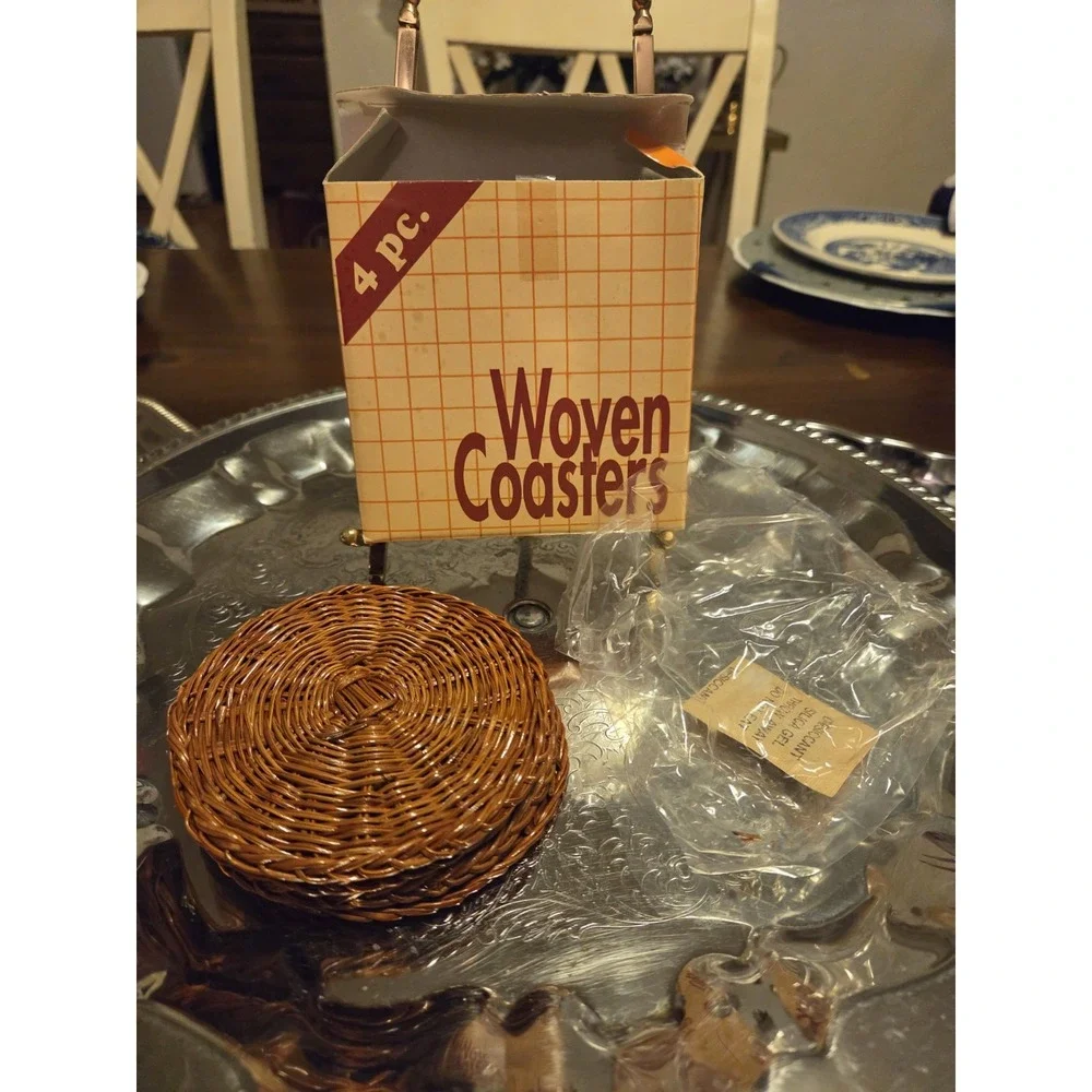 vintage 4-piece set of woven wicker/rattan coasters.